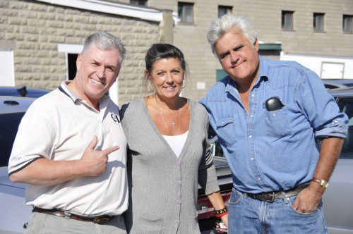 VINTAGE CAR ENTHUSIAST Jay Leno was in Wakefield Friday, visiting Dave and Wendy Castine at the space they rent for their classic car sales and consignment business in the old NAPA Auto Parts store on Main Street. 