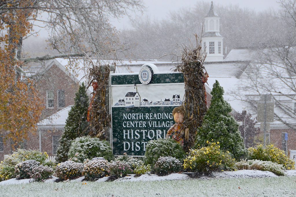 LAST WEEKEND'S stormy weather brought an unpleasant surprise – the season's first snow fall, creating an early winter scene in the town center. Luckily, accumulation didn't amount to much, unless you live in Maine. (John Friberg Photo)