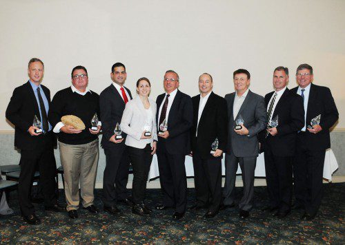 THE 13TH induction ceremonies of the Wakefield Memorial High School Athletic Hall of Fame took place on Saturday night at the Crystal Community Club. From left to right are inductees Andrew Conley, Mike Buckley (accepting the honor for his later father, Peter), Mike Sorrentino, Lee-J. Mirasolo, Peter Rossi, Rick Boyages, Mike Boyages (Head Coach of the 1999 Super Bowl champion football team), Dennis Melanson and Dave McCarthy.