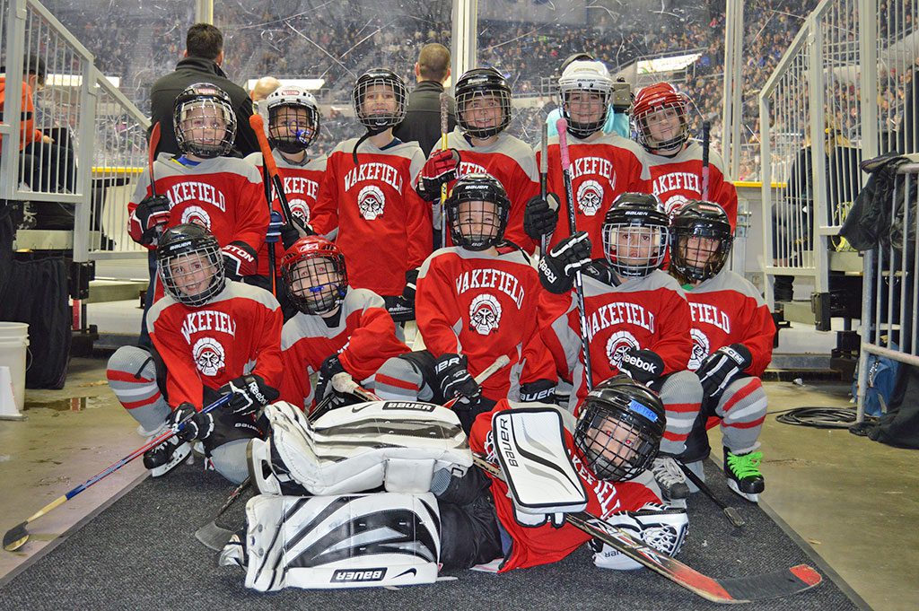 THE Wakefield Mite 2 hockey team played at a Providence Bruins game on Nov. 9. In the front row (from left to right) are Jack Van Dorpe, Cash Kearney, Trevor Veilleux, Tommy Defeo, Rebecca Melanson, and goalie Matthew Reed. In the back row (from left to right) are Cameron DePrizio, Cole Reeves, Andrew Poires, Tylor Roycroft, Ethan Jussaume and Julia Welch.