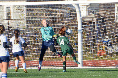 SOPHOMORE MARISSA ZARELLA (14) scored North Reading's only goal against Lynnfield on this very nice play. (John Friberg Photo)