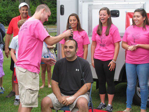 SUPERINTENDENT of Schools Dr. Stephen K. Zrike agreed to let high school seniors shave his head if a reading challenge was met — 10,000 books read over the summer months. The challenge was met and in mid-September he was sporting a new “do.” (File Photo)
