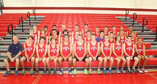 THE WMHS boys’ cross country team had a successful 2014 season. In the front row (from left to right) are Coach Perry Pappas, Tyler Whipple, Alex Guerriero, Alec Rodgers, Eddie Massabni, Jack Gallagher, Nick Hill, Jeremy Keegan, Chris Skeldon, Adam D’Ambrosio and Tommy Lucey. In the second row (from left to right) are Chris Bossi, Justin McGonagle, Joe Picano, Steven Racamato, John Stanfield, Ryan Sullivan, Cal Sylvia, Matt Finn, Jackson Kehoe and Nolan Collins. In the third row (from left to right) are Sam Morey, Andre Massabni, Michael Frezza, Ty Collins, James Connors, Jack Stevens, Sam Veerman, Robert Shaw, David Lee, Riley Brackett and Matt Greatorex. Missing from the photo are Jared Matos, Shahnawaz Anwar, Joe Boudreau, Richard Custodio and Brian Lomasney. (Donna Larsson File Photo)