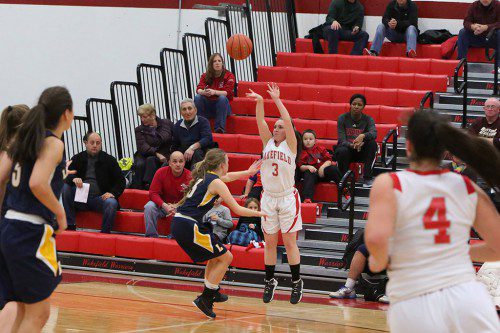 SENIOR GUARD Amanda Boulter (#3) scored 13 points with a three-pointer as the Warrior girls’ hoop team posted its second straight win with 52-38 victory over Reading last night at the Charbonneau Field House. (Donna Larsson File Photo)