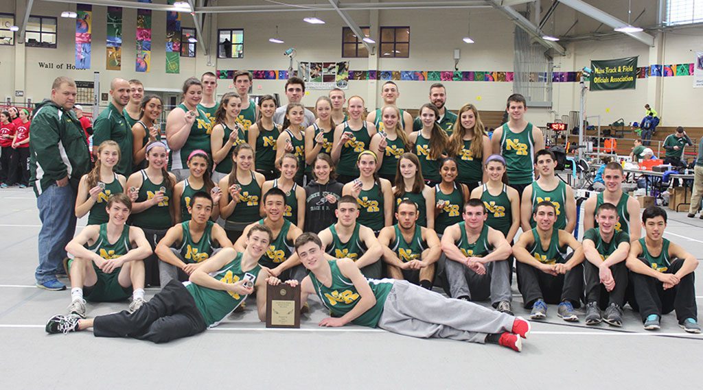 PLENTY TO CELEBRATE. The NRHS boys' and girls' indoor track and field teams brought home a combined 51 medals and 71 points in the Div. 5 State Relay Championships. The boys were runners up with 37 team points while the girls took third with 34 points. Front row, with plaque: Brendan Carter and Aidan McDonald; seated, from left: Jackson Hastings, Justin Zhang, Ben Hui, Angelo DiSanto, Nicholas Copelas, Alex Brown, Anthony Tramontozzi, Liam Rutherford, George Giunta; kneeling, from left: Jenna Raffael, Sophie Warren, Marissa Zarella, Cole Godzinski, Kerri-Ann Donovan, Karah Gravallese, Tori Brown, Meredith Griffin, Jerlin Kaithamattam, Jillian Comeau, Dan Coveney, Kyle Bythrow; standing, from left: Coach Matt Dorothy, Head Coach Sotirios Pintzopoulos, Anna Tayas, Elizabeth Flett, Alexa Capozzoli, Haley Nathan, Olivia DeMonico, Margaret McCarthy, Lauren Gulbicki, Jillian McCullough, Julia Tatone, Tara Driver, Ryan McAneny; back row, from left: Greg Landry, John Lewis, Peter Audier, Jake O'Connell, Adam Sapp, Nick Colangelo, Coach Ryan Spinney. (Courtesy Photo)