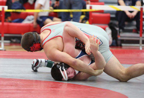 DAN WENSLEY, a senior (top) won three matches by pin to take first place at the 195 weight class in the Belmont Tournament on Saturday. (Donna Larsson File Photo)