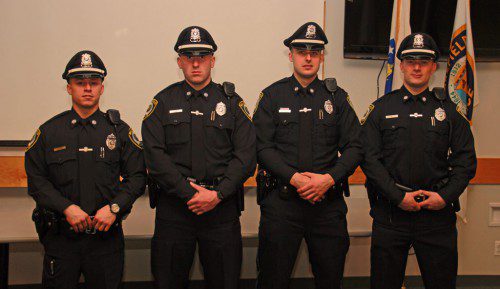 FOUR new police officers were sworn in at the Wakefield Police Department on Tuesday, Feb. 9. They are, from left: Officer Russell Carman, Shawn Conway, Kyle Meehan and Matthew Surette. (Courtesy Photo)