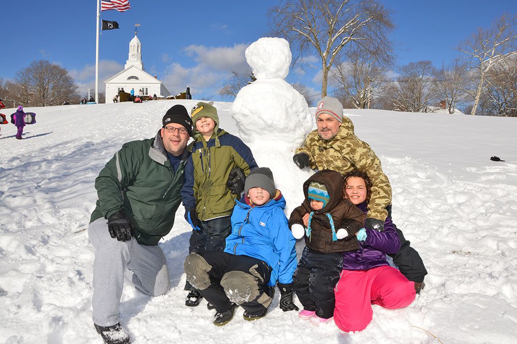 A SNOWMAN came to life on the town common last weekend, thanks to the efforts of, (from left): Frank and James Fodera, John Weir, Faith, Josie and Steve Cote. (Bob Turosz Photo)