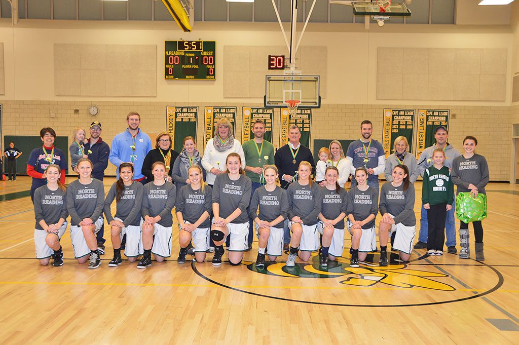 THE NRHS GIRLS BASKETBALL TEAM held their second annual Teacher Appreciation Night before the start of their game against Essex Tech. Each player selected one member of the faculty to be honored. Girls, front row, from left: Kirsten Bradley, Lindsey Carroll, Katerina Hassapis, Gabrielle Lanzaro, Katherine Welch, Jessica Lezon, Carli Marie Eldridge, Tristan Hoffman, Julia McDonald, Carly Swartz, Francesca Elliott and Adrianna Flanagan, (standing in second row, far right). Teachers, standing from right: Mary Heinold, Brian McAuliffe, Kevin Lentini, Martha Dwyer, Jessica Buckley, Lillian Diezemann, Andrew Dexter, David Johnson, Amy Campobasso, Ryan Spinney, Claudia Brown and Jeff Wall. (Bob Turosz Photo)