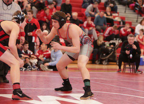 DAN BERTINI, a senior (right), earned a victory by a 7-4 decision at the 152 weight class in Wakefield’s dual meet against Melrose last night at the Charbonneau Field House. The Warriors lost to the Red Raiders, 43-24. As result, Wakefield, Melrose and Burlington finished in a three-way tie for the Middlesex League Freedom division title. (Donna Larsson File photo)