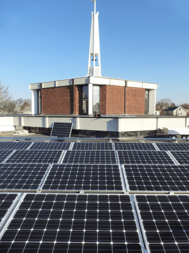 SOLAR PANELS ON THE roof of the First Congregational Church are projected to save $270,000 over their lifetime.