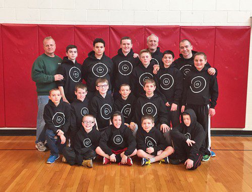 The Melrose Youth Wrestling team gathered recently for a team photo. Pictured, 1st row sitting -l-r Sean Thomas, Stephen Fogarty, Bobby Morrison, CJ Boyce. 2nd row kneeling- Jake Pettipaw, Shea Fogarty, Liam McCauley, Max Pettipaw, Jude Douglas. Standing: Coach MacIntosh, Kevin Carney, Jan Mejia, Jackson Curran, Stephen MacIntosh, Sean Herbert, Jude Douglas. Back Row Coach Morrison, Coach Jeremy Chavarria. (courtesy photo) 