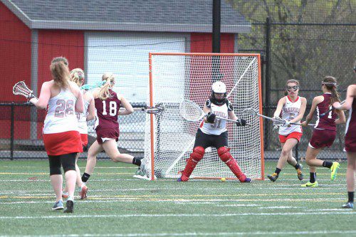 JUNIOR GOALIE Bianca Passacantilli reruns in goal for the Warriors. Senior Gianna Tringale (#5) also returns this spring and is one of the two captains on the squad. (Donna Larsson File Photo)