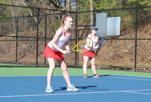 THE FIRST doubles team of Grace Hurley (left) and Abby Chapman (right) earned a 6-1, 6-2 victory in Wakefield’s match against Stoneham yesterday afternoon at the Dobbins Courts. The Warriors rolled to a 5-0 triumph. (Donna Larsson File Photo)