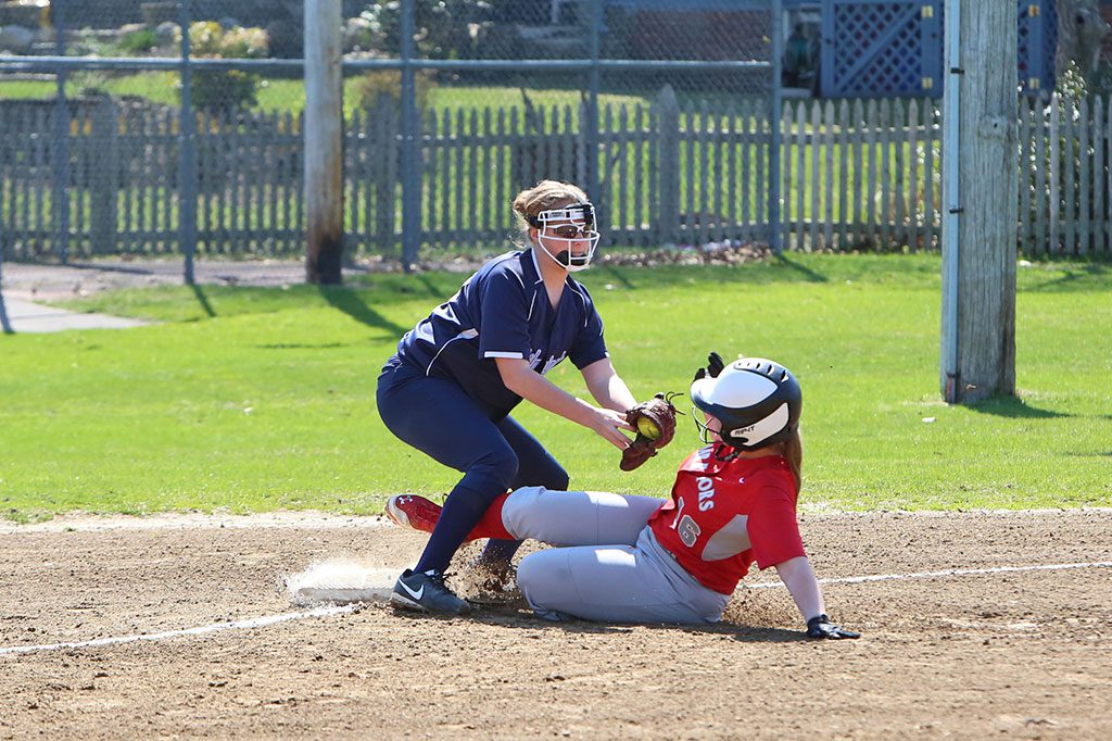 HAYLEY KADDARAS (#16) slides into third base safely in Wakefield’s game against Wilmington on Wednesday at Vets’ Field. The Warriors posted a 13-4 triumph to go to 6-1 on the season. (Donna Larsson Photo)