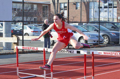 SARAH BUCKLEY, a junior, came in second in the 100 hurdles with a time of 17.3 seconds and she came in third in the triple jump with a leap of 31-10 in Wakefield’s meet against Wilmington yesterday afternoon. (Donna Larsson File Photo)