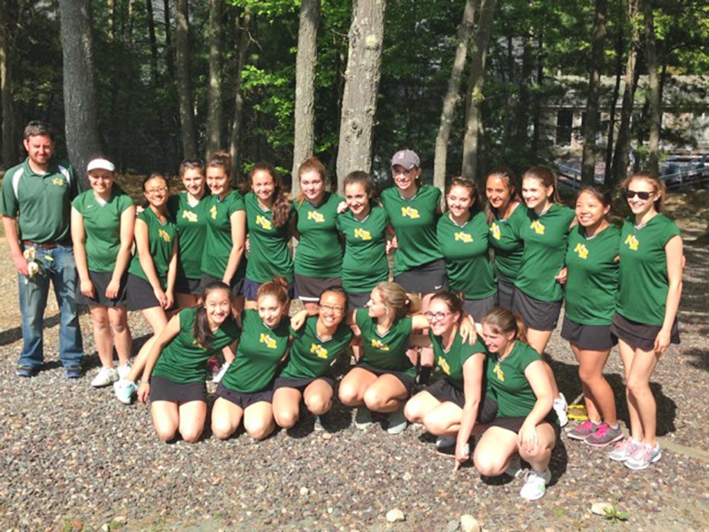 THE 2015 NRHS Girls Tennis Team defeated Hamilton–Wenham in their final match of the season to enter the state tournament 14–1. (Courtesy Photo)