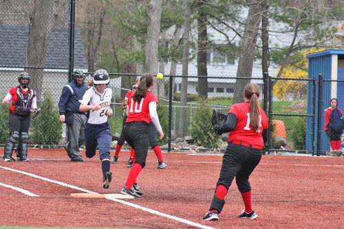 RACHEL Badger beats the throw to first to start the seventh inning rally that led to the Pioneers' 6-5 come-from-behind win over Masconomet last Friday at home. (Maureen Doherty Photo)