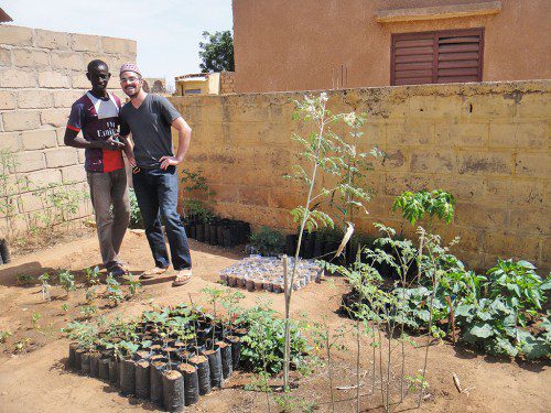 GARDEN of Eden. Corey Dolbeare and his brother Abou admire the fruits of their labor in the garden Dolbeare established for the village of Goudoude where he lives in Senegal as an agroforestry volunteer with the Peace Corps.
