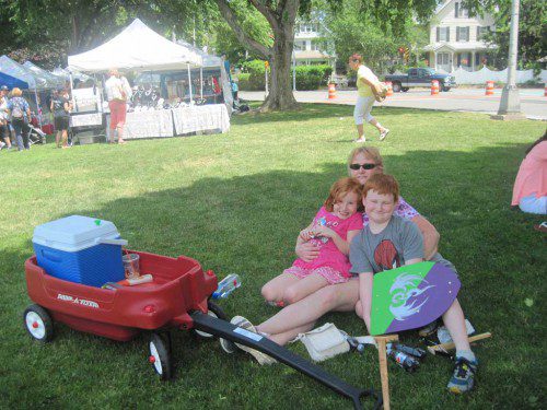 THE Faraday family of Foxboro traveled to Wakefield to attend Festival by the Lake. Sienna, 6, and Jaice, 11, are shown with their mother Samantha Faraday. 