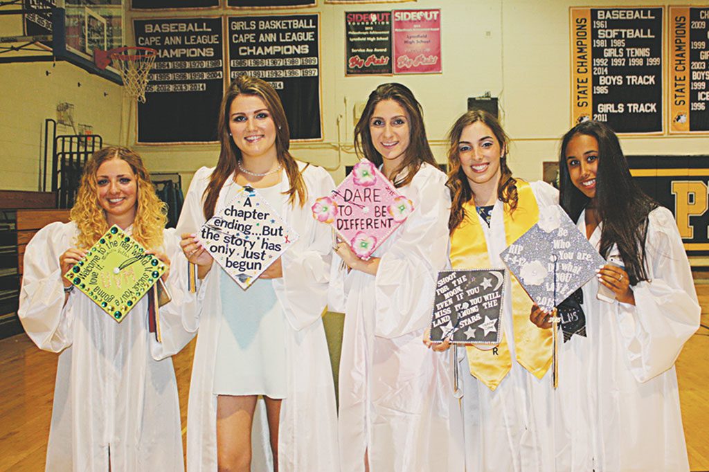 IT'S WHAT every well-dressed graduate is wearing. Displaying their whimsical and personalized mortarboards are LHS seniors, from left, Laura Bassi, Olivia Winsor, Kristina Sidiropoulos, Jessica Infiorati and Marlena Ramos (Maureen Doherty Photo)