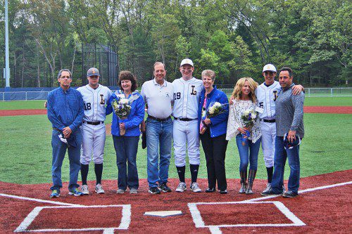 SENIOR DAY was celebrated by the four-time CAL Champion Pioneers baseball team during the final home game of the season against Ipswich. The seniors shown with their parents are (from left): Greg Basilesco with his parents Gary and Sue; Andrew Moorman with his parents Steve and Elaine; and Nick Pascucci with his parents Susan and Mike. (Courtesy Photo)