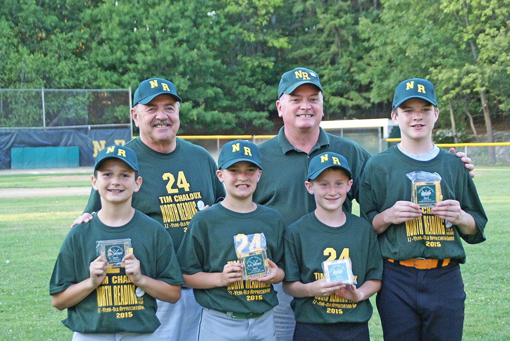 CHALOUX GAME STANDOUTS. The third Annual NRLL/Tim Chaloux 12-Year-Old Appreciation Game was held last Friday evening at Benevento Fields with more than 40 Little Leaguers taking part. Honored for their efforts were (first row, left to right) Aidan Smith, who received the Field 1 Spirit Award; Brady Miller, winner of the Field 2 Spirit Award; Zach Baker, who was the MVP on Field 2; and Will O’Leary, the MVP on Field 1. Standing with the recipients are Stan Chaloux, father of the late Tim Chaloux, whom the game honors, and North Reading Little League President Eddie Madden. (Courtesy Photo)