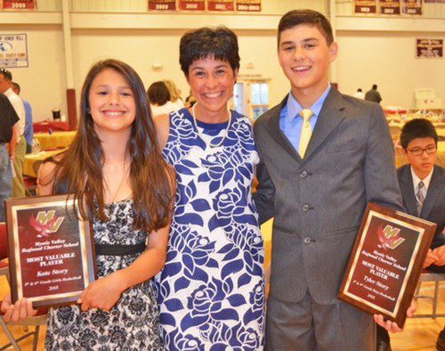 KATE AND TYLER Story of Melrose were recently awarded MVP honors for their performance on the Mystic Eagles basketball program. The duo are pictured with their mom, Gina. (courtesy photo)