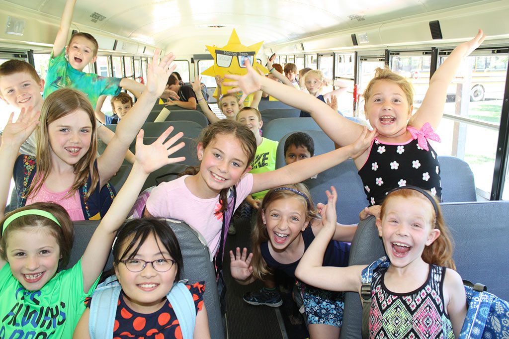 THESE SUMMER STREET students were beyond excited to head home on the last bus ride of the year and begin their summer vacation on June 24. (Dan Tomasello Photo)