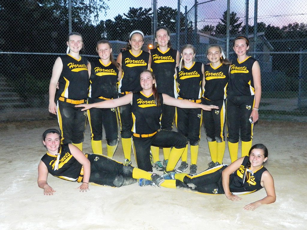 THE NORTH READING Girl's U14 team lead by Coaches Cory Bilodeau, Mike LeBlanc, Bill Scott and Keith Zewiey ended their summer season with the girls coming from behind to take the lead and win the game with a score of 9-8. The Hornets had 10 wins, 3 losses, and a tie with an impressive nine game winning streak this season. Currently they are in fourth place out of 36 teams, with a legitimate shot at securing a third place finish. Sliding into home are Julia DiNapoli and Makenna Lamont. Calling them safe is Codi Eicher. From left to right, Abby Belbin, Taela Scott, Maggie Majeski, Hailey Sanphy, Samantha Galvin, Abigale Bilodeau, and Jess LeBlanc. Missing from photo is Vanessa Zewiey. (Courtesy Photo)