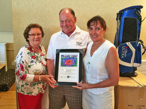 THE LEE FAMILY, owners of the Horseshoe Grille, was presented with a special plaque from the Jimmy Fund for their 30 years of raising funds for the cancer organization through the Horseshoe’s annual golf tournaments. Veronica Lee and her late husband Pat started raising money for the Jimmy Fund 60 years ago and did so for 30 years by themselves. From left: Veronica, Pat and Kathi Lee. (Courtesy Photo)