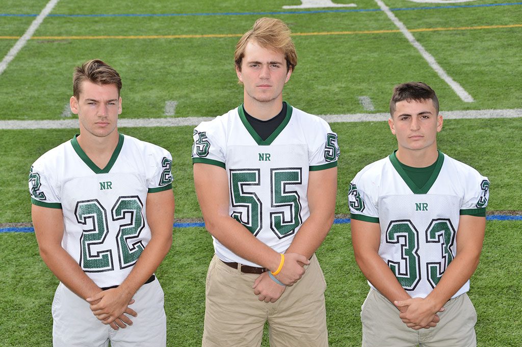 CAPTAINS' CORNER. Three captains will lead the Hornets on the grid iron this year. From left: David Smith, Nic O'Connell and John Merullo. (Bob Turosz Photo)