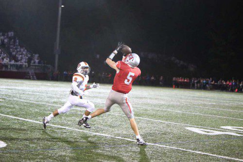 SENIOR WR Tighe Beck (#5) had five reception for 110 yards and a touchdown on Friday night at Landrigan Field. (Donna Larsson Photo)