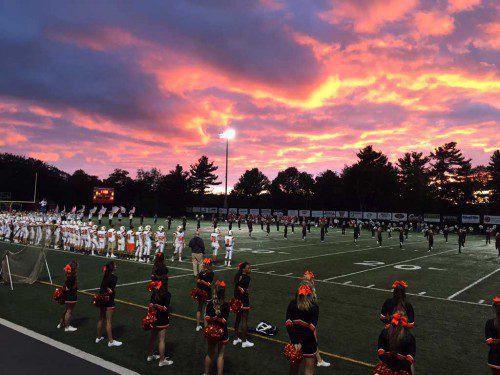 THE SUN BEGINS TO SET ABOUT 10 minutes before kickoff Friday night as the Warriors opened their 2015 football season against the Beverly Panthers. (Matt McPhail Photo)