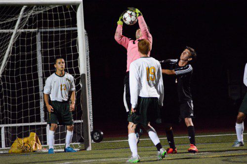 GOAL KEEPER Billy Brandano comes up big on this save to secure the shutout in North Reading’s 5–0 victory over Ipswich. (Deanna Castro Photo)