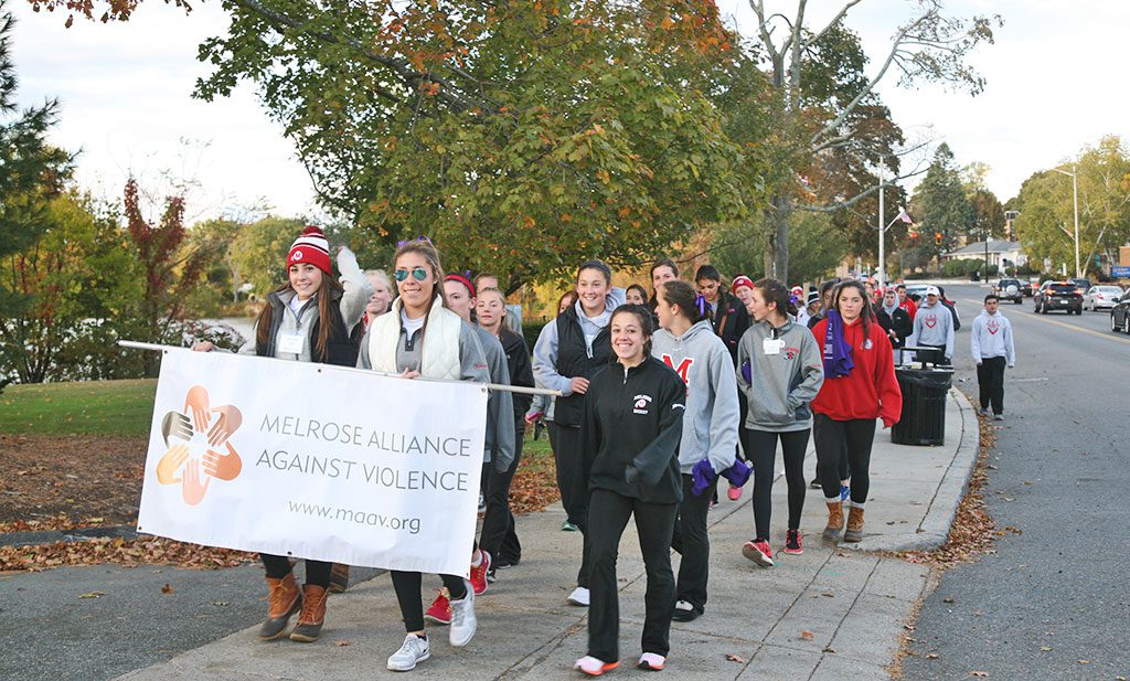 THIS YEAR’S Candlelight Walk and Vigil hosted by the Melrose Alliance Against Violence drew hundreds of participants including the Red Raider girls soccer team, who led the walk. The event raises awareness of the need to prevent domestic and dating violence. (Richard Cohane Photo)