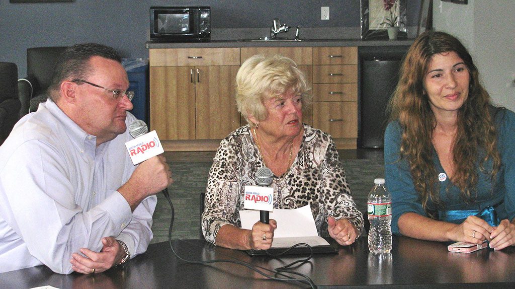SAVE UNION HOSPITAL volunteers Mary Stewart of Lynnfield (center), Katerina Panagiotakis of Lynn and Rep. Brad Jones (R-North Reading) appeared on Boston Herald Radio's remote broadcast last Friday from the Al Merritt Media Center at MarketStreet in Lynnfield. Save Union Hospital opposes Partners HealthCare's plans to close the Lynn hospital and consolidate its services with Salem Hospital. (Mark Sardella Photo)