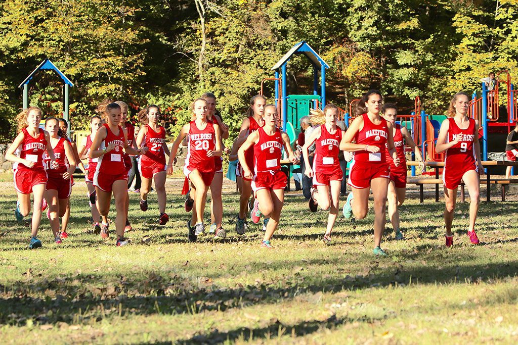 THERE WAS a sea of red yesterday afternoon at the start of the varsity girls’ race yesterday afternoon at the Greenwood Park Course. Wakefield topped Melrose, 25-38, in a Middlesex League Freedom division clash. (Donna Larsson Photo)