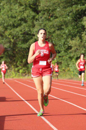 SARA CUSTODIO, a senior, came in second in Wakefield’s meet against Wilmington with a time of 21:01 as the Warriors posted a 20-38 win over the Wildcats. (Donna Larsson File Photo)