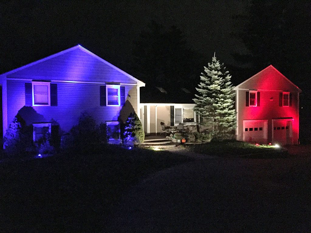 THE EMRICH FAMILY of Shirley Ave. lit their home in the colors of the French national flag – blue, white and red – to show solidarity with the people of Paris following last weekend’s terrorist attacks. (Courtesy Photo)