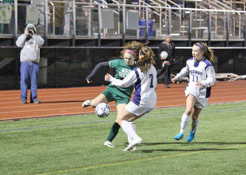 HORNET SOPHOMORE, midfielder Juliette Nadeau, makes her move against Medway in the state semi final game won by Medway in a squeaker. (Steve Nathan Photo)