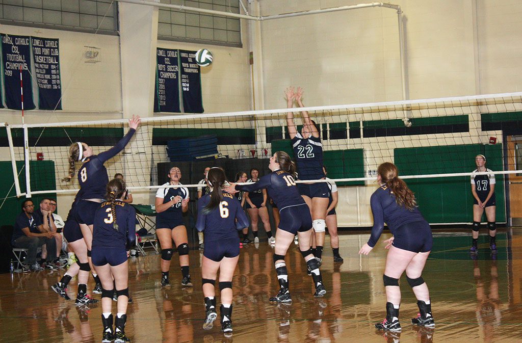 JUNIOR Katie Nugent (8) nails a shot over the net during the Pioneers’ 3-0 win over Lowell Catholic in the Division 3 North quarterfinals Nov. 7. Nugent finished with 10 kills, seven digs and two aces against the Crusaders. (Dan Tomasello Photo)