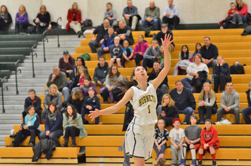SENIOR CAPTAIN and four–year starter Carly Swartz will lead the Hornet offense as point guard this season. Swartz scored 16 points in the win over Masconomet. (Transcript file photo)