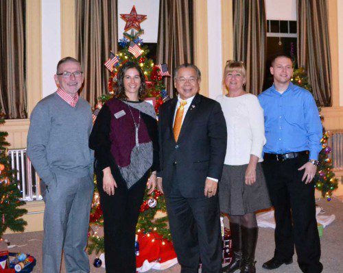 SEVERAL MEMBERS OF the Wakefield Lynnfield Chamber of Commerce attended the 2nd annual multi-Chamber Christmas Tree Festival hosted by the MEG Foundation in Saugus. Enjoying the decorated trees are (from left to right) Chamber members Chris Callanan, North Shore Pool & Spa; Chamber Executive Director Marianne Cohen; State Representative Donald H. Wong; Chamber Director Ann Hadley, JC Marketing Associates, Inc.; and Chamber member Andy Giles, Boston InfoSystems, Inc. 