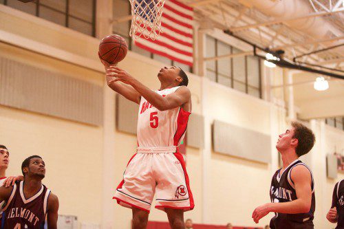 DEVONDRE WILLIAMS' 23 points weren't enough for the Melrose Red Raider basketball team who fell to Belmont Tuesday night at the Melrose Middle School gym, 66-58. (Donna Larsson photo) 