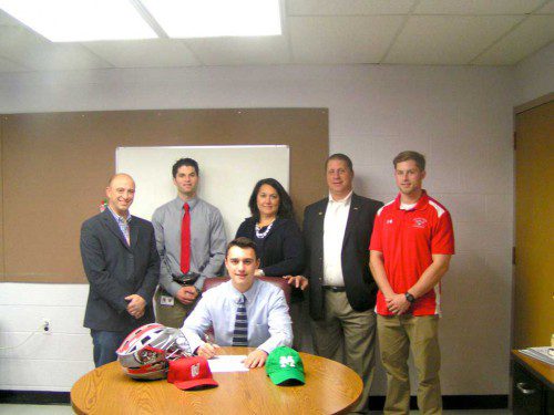 WMHS SENIOR Brandon Grinnell (front row) signed his letter of intent to play lacrosse at Manhattan College next fall. In the back row (from left to right) are WMHS Principal Richard Metropolis, K-12 Director of Athletics, Health, and Wellness Brendan Kent, Ann Grinnell, Chad Grinnell and WMHS Boys' Lacrosse Head Coach Andrew Lavalle. (Jim Southmayd Photo)