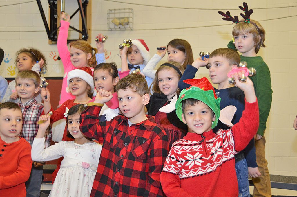 KINDERGARTEN STUDENTS at the Little School ring in the holidays with “Season of the Bells” at the school’s annual winter concert. (Bob Turosz Photo)
