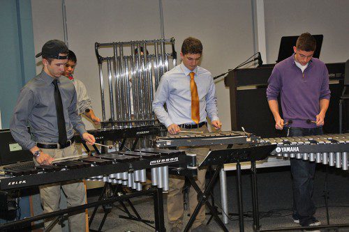 HIGH SCHOOL students, from left, Jesse Valway, Nick Zhang, Tyler Murphy and Zach Bisconti were part of a percussion ensemble that performed a cover of the 1980’s New Wave classic Take On Me by A-Ha during Lynnfield High School’s Open Studios Jan. 14. (Dan Tomasello Photo)