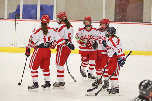 THE MELROSE girls’ varsity ice hockey team picked up recent wins over Medford and Wilmington to a successful start to the season. (Donna Larsson photo)