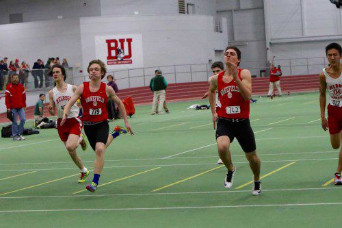 SPRINTERS Henry Strikeman (left) and Kevin Russo (right) were members of two of Wakefield’s relays that medaled last Friday night in the Div. 4 state relays at the Reggie Lewis Track and Athletic Center. The Warriors finished fifth in the team scoring. (Donna Larsson File Photo)